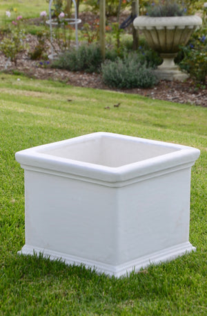 The Faraway Garden Chelsea Box Planter is a classic shape with simple lines and elegantly moulded rim. This planter can be used in either traditional or contemporary outdoor settings.   This large planter is perfect in rows on a terrace, entrance or beside the pool and is equally elegant on its own. Stunning planted in green box, a small tree, a rose or in a mass of flowers.