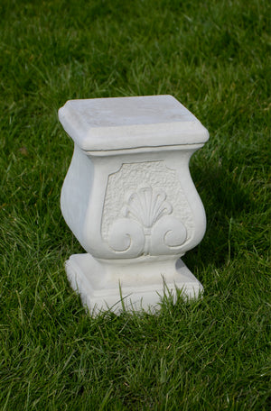 The Faraway Garden Harlowe Pedestal is an elegantly shaped plinth with distinctive detailing on the sides. A pair of these pedestals flanking both sides of your garden entrance makes a refined and elegant statement. Partnered with one of our statues or a planter to complete the look.