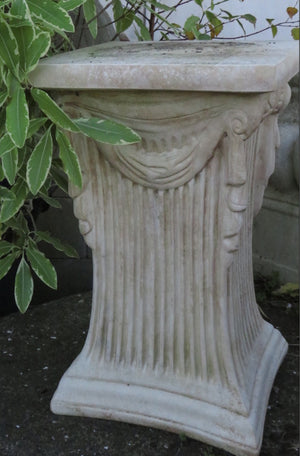 The Faraway Garden Venetian Pedestal is a statement pedestal with elaborate swagging and vertical moulding on all sides. This stunning pedestal partners perfectly with many of our statues, urns and other unique objects for the garden.