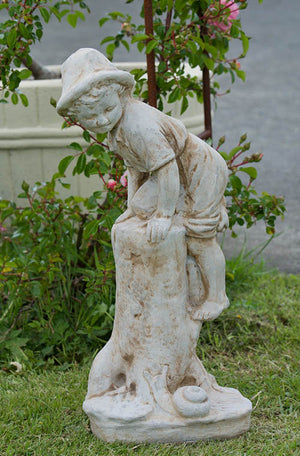The Faraway Garden Boy with Snail is a small statue depicting a boy climbing a log to escape from a snail. A delightful addition to any garden setting and looks great in our sepia wash for an aged effect. 