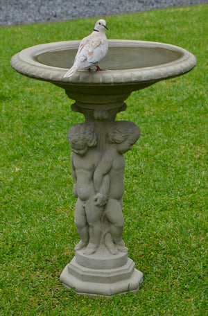 This elegant, classical bird bath is a beautiful showpiece in any garden setting with its pedestal of three cherub, or putti, standing on an octagonal base holding up a generous, distinctively edged bowl.  Perfect in a more formal rose garden or nestled in a rambling herbaceous border. NZ made bird baths.