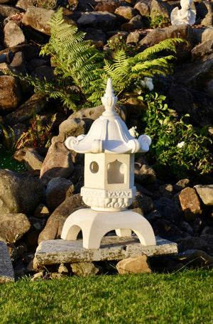 The Faraway Garden Pagoda is a stunning object inspired by the spiritual towers of eastern Asia with elegantly curved roof detail and hexagonal shape. It is perfect for formal gardens and rockeries or to enhance terraces and can be used as a candle holder or a light feature for your property entrance.