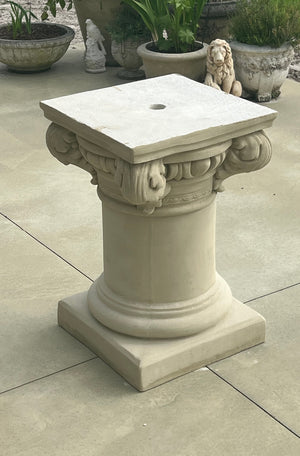 The Faraway Garden Baroque Pedestal is an elegant pedestal inspired by the classical Greek aesthetic with elaborate leaf moulding, circular column and square shaped base. This pedestal can be increased in size by adding a second central round pillar.  This unique garden pedestal would look stunning with one of our large urns as a focal point at the end of pathway or the centrepiece of a rose garden.