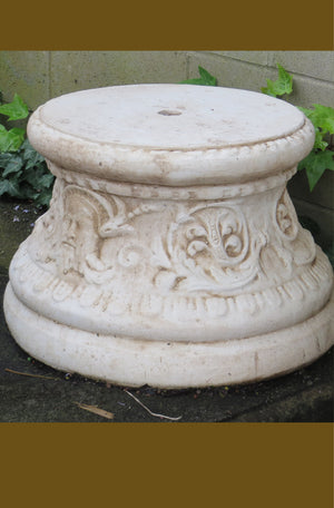 The Faraway Garden Neptune Pedestal is a versatile pedestal with elaborate moulding of classically inspired themes and motifs. This impressive round pedestal partners perfectly with many of our statues, urns and other unique objects for the garden.