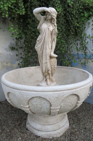 The Faraway Garden Bella Donna Planter is a beautiful combination of classical statue and pedestal standing within a large bowl planter on a pedestal. This impressive planter works wonderfully on a lawn, in a rose garden or nestled in an herbaceous border. It makes a great focal point in a formal flower bed or at the end of a green hedge walk.  This planter also makes a stunning water feature.