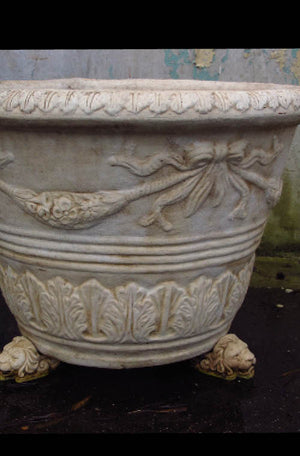 The Faraway Garden Capri Pot is a large, elegant garden planter inspired by classical Italian aesthetic with distinctive swag and acanthus moulding around bowl and egg and dart pattern on rim.  This impressive garden planter looks stunning as part of a group or row; or as a focal point at the end of a walkway or as a pair flanking an entrance. An ideal planter for ornamental trees.  This pot is part of the Phoenix Italia collection and can have the traditional sepia wash for an aged effect (as pictured).