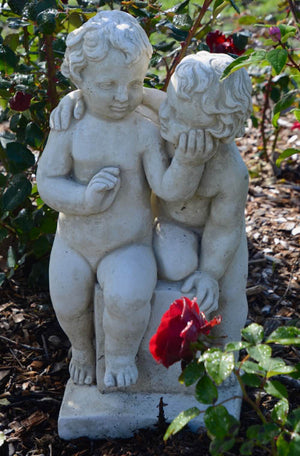 The Faraway Garden Friends is a classical, smaller garden statue featuring two cherub friends. It works wonderfully in a rose garden or nestled in an herbaceous border and makes a delightful focal point when raised on a pedestal in a formal flower bed, in a bird bath or positioned amongst potted urns. This statue is great when coloured sepia for an aged effect.