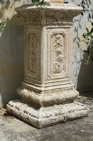 The Faraway Garden Laurent Pedestal is impressively elegant with fielded panelling combined with classical botanical detailing to the shaft, and strong linear moulding with further plant themes at base and top. This tall pedestal partners perfectly with many of our planters, urns and unique objects for the garden.
