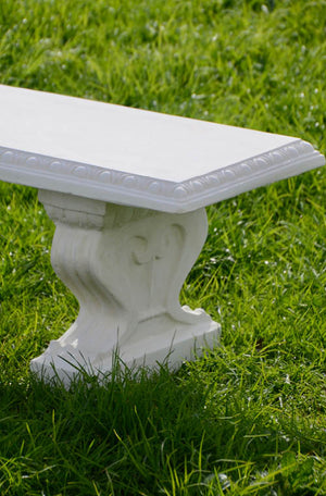 While away the hours on this beautiful, classically proportioned bench seat with decorative moulding on the edge and scrolled seat supports.  A well placed bench is an invitation to explore a garden, a place to restore, and a place to view your garden from a different vantage point. A bench can be around a corner, hidden as a surprise or at the end of a lawn, on a terrace or beside a wall beneath a rambling old rose.