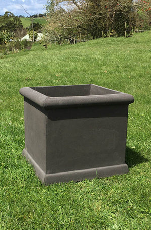 The Faraway Garden Parnell Square Planter is a cube shape with linear detailing and rolled edging. This large planter can be used in both traditional and contemporary outdoor settings.   This planter is ideal in groupings or rows and equally elegant on its own. Stunning planted in green box, ferns or an ornamental or fruit tree.