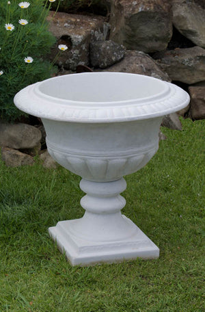The Faraway Garden Wollstonecraft Urn is a classically elegant planter inspired by the distinctive designs of the Regency period, featuring egg-and-dart detailing to the rim and gadrooning to the bowl.
